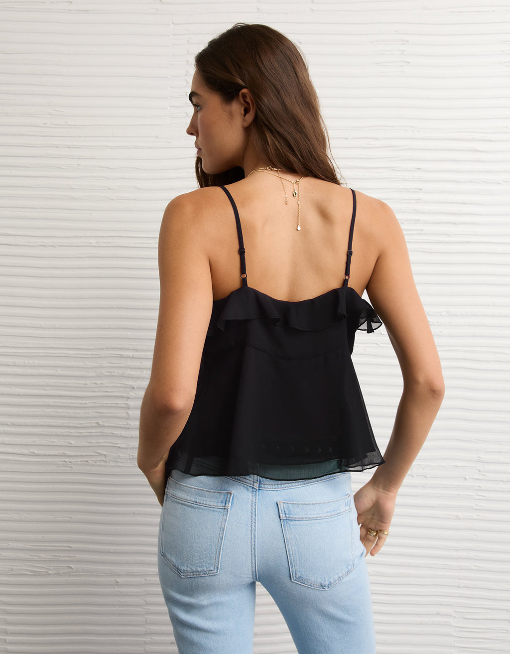 Camiseta sin mangas con volante - Negro 2351_6503_001_ob