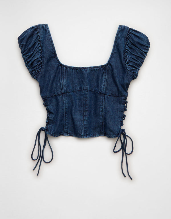 Blusa con cordones laterales. - Generico